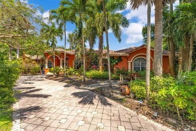 Located on a quiet street in the heart of Pinecrest, this - photo 3