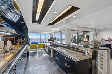Architect-owned dual-level penthouse offers a serene retreat - photo 24