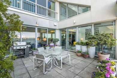 Architect-owned dual-level penthouse offers a serene retreat - photo 27