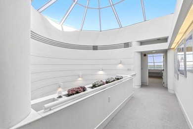 Architect-owned dual-level penthouse offers a serene retreat - photo 35