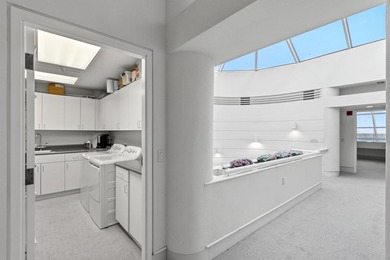 Architect-owned dual-level penthouse offers a serene retreat - photo 36