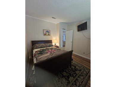 Waterfront living in Silver Dollar Golf and Trap Club, an - photo 44