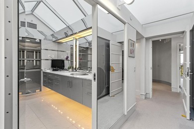 Architect-owned dual-level penthouse offers a serene retreat - photo 48