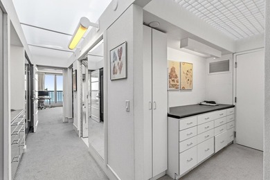 Architect-owned dual-level penthouse offers a serene retreat - photo 50