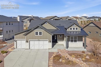 This stunning ranch-style gem in Flying Horse offers the perfect - photo 1