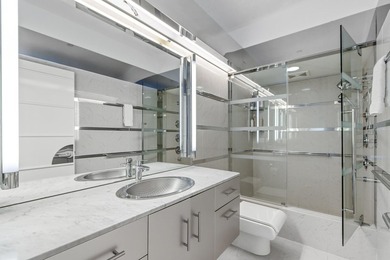 Architect-owned dual-level penthouse offers a serene retreat - photo 52