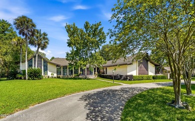 Vaulted ceilings and sunlit interiors define this elegant - photo 1