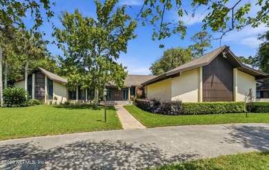 Vaulted ceilings and sunlit interiors define this elegant - photo 2