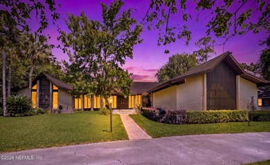 Vaulted ceilings and sunlit interiors define this elegant - photo 3