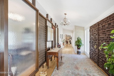 Vaulted ceilings and sunlit interiors define this elegant - photo 6