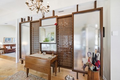 Vaulted ceilings and sunlit interiors define this elegant - photo 7