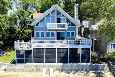 This 5-BD, 4-BA, 3,847-square-foot, 3-story home w/ 70 feet of - photo 2