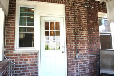 FOR SALE Beautiful & Versatile 3-Family Brick Home in Prime Bath - photo 8