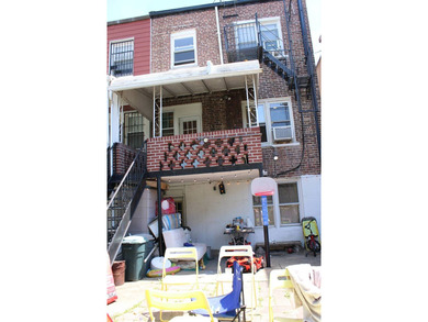 FOR SALE Beautiful & Versatile 3-Family Brick Home in Prime Bath - photo 9