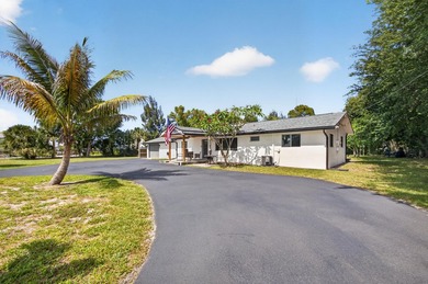 Situated on a rare, oversized lot with serene pond views, this - photo 5
