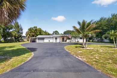 Situated on a rare, oversized lot with serene pond views, this - photo 7