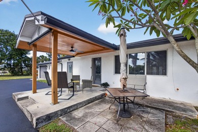 Situated on a rare, oversized lot with serene pond views, this - photo 8