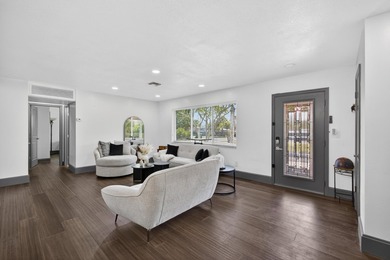 Situated on a rare, oversized lot with serene pond views, this - photo 10