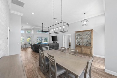 Modern luxury home in the gated community of Lacuna featuring - photo 12