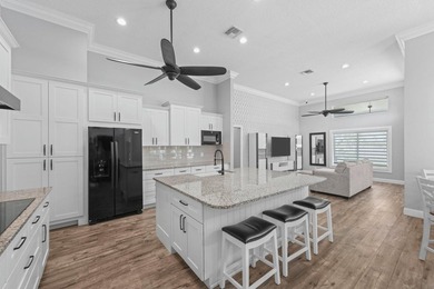 Modern luxury home in the gated community of Lacuna featuring - photo 16