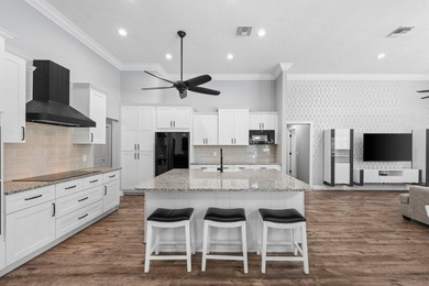 Modern luxury home in the gated community of Lacuna featuring - photo 17