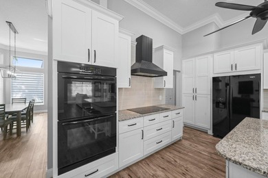 Modern luxury home in the gated community of Lacuna featuring - photo 18