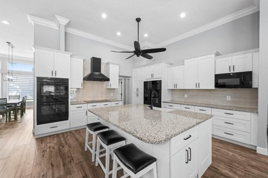 Modern luxury home in the gated community of Lacuna featuring - photo 19