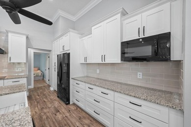 Modern luxury home in the gated community of Lacuna featuring - photo 22