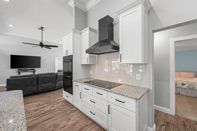 Modern luxury home in the gated community of Lacuna featuring - photo 23