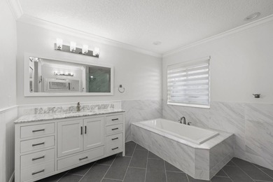 Modern luxury home in the gated community of Lacuna featuring - photo 32
