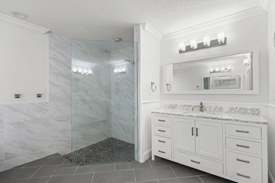 Modern luxury home in the gated community of Lacuna featuring - photo 33