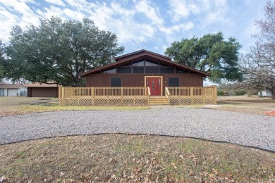 Sitting on two lots totaling almost half an acre and within - Lake Home Sale Pending in Gun Barrel City, Texas