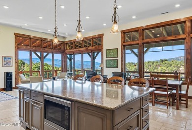 STUNNING LUXURY RETREAT! This captivating legacy ranch is just - photo 12
