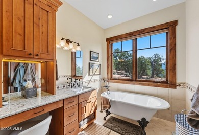 STUNNING LUXURY RETREAT! This captivating legacy ranch is just - photo 14