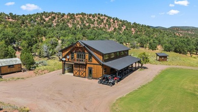 STUNNING LUXURY RETREAT! This captivating legacy ranch is just - photo 16