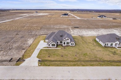 There's an immediate sense of ease as this single-story home - photo 8