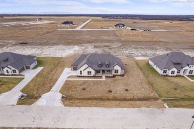 There's an immediate sense of ease as this single-story home - photo 10