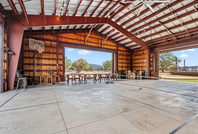STUNNING LUXURY RETREAT! This captivating legacy ranch is just - photo 29