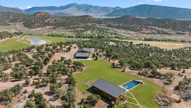 STUNNING LUXURY RETREAT! This captivating legacy ranch is just - photo 32