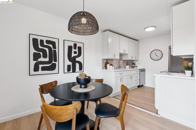 Top floor sun-splashed 2 Bedroom and 1 bath updated condo is - photo 3