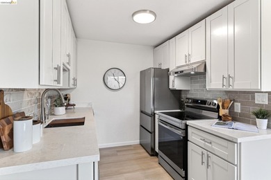 Top floor sun-splashed 2 Bedroom and 1 bath updated condo is - photo 6