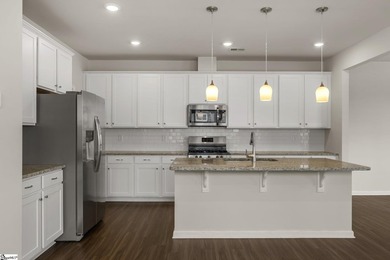 Built in 2023, this beautifully maintained end-unit townhome in - photo 14