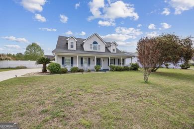 As you arrive at this Baytown-style home, you're welcomed by a - photo 1
