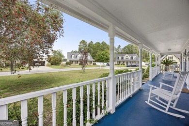 As you arrive at this Baytown-style home, you're welcomed by a - photo 5