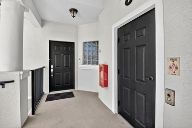 Welcome to this spacious 3-bedroom, 2-bath condo located in the - photo 2