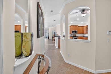 Welcome to this spacious 3-bedroom, 2-bath condo located in the - photo 3
