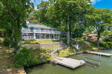 Welcome to this beautifully renovated lakefront retreat offering - photo 1