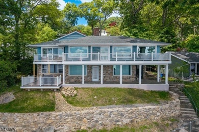 Welcome to this beautifully renovated lakefront retreat offering - photo 2
