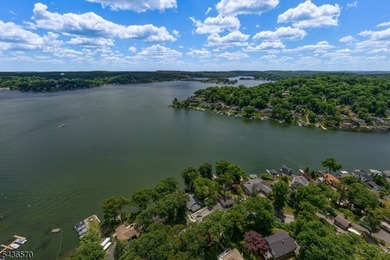 Welcome to this beautifully renovated lakefront retreat offering - photo 3