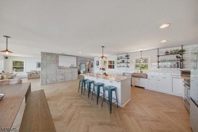 Welcome to this beautifully renovated lakefront retreat offering - photo 4